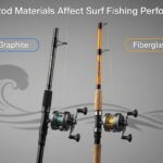 Graphite and fiberglass surf fishing rods compared side by side showing material differences and construction